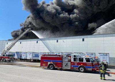 Huge blaze tears through Walmart distribution centre
