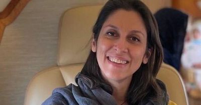 Nazanin Zaghari-Ratcliffe beams as she finally boards plane to UK - and she's wearing Ukraine colours