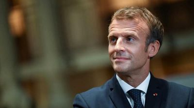 Macron to Unveil Program as Election Looms