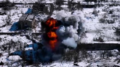 VIDEO: Russian Tank Trundles Over Stream In Snowy Village Before Ukrainian Missile Blows It To Bits
