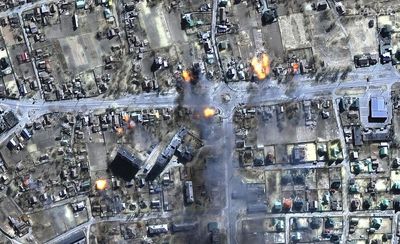 Satellite imagery shows bombed theatre and burning buildings across Ukraine