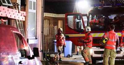 Eight fire engines rush to blaze in roof of terrace house in Ashton