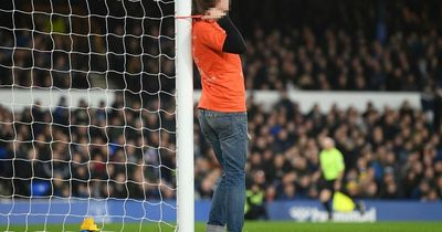 Everton vs Newcastle delayed for over 10 minutes as protester ties himself to goalpost