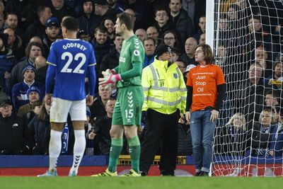 Everton vs Newcastle delayed for six minutes after protester ties neck to goalpost