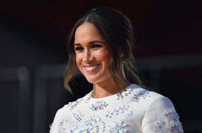 Queen hands Meghan Markle’s National Theatre patronage to Camilla