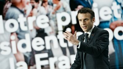 Macron promises tax cuts, welfare reform in election manifesto