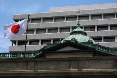 Bank of Japan says no tightening as oil stirs inflation