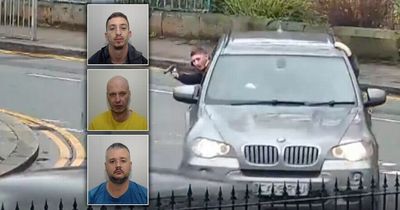 Dramatic footage shows gun-toting thug open fire in BMW drive-by shooting - catching innocent bystander in crossfire