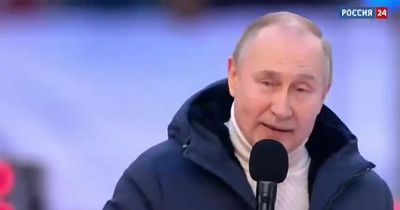 Vladimir Putin 'vanishes mid-sentence' live on TV while giving speech at pro-war rally