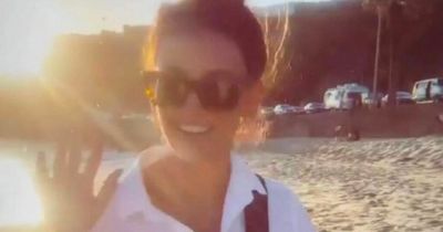 Michelle Keegan looks incredible as she frolics on California beach in all-white outfit