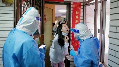 Why are many Chinese elderly unvaccinated against COVID-19 when they're a priority group in countries such as Australia?