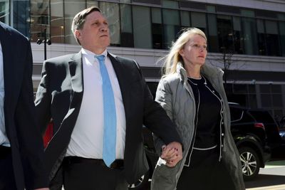 Parent convicted in college bribery case asks to remain free