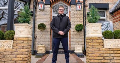 The road where tinned up houses meet upscale hotels