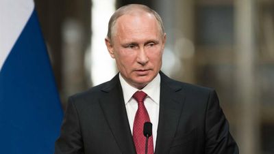 Putin fronts rally, cost of living key to budget