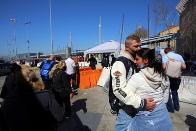 Stuck at Mexico border, anti-war Russians sweat their futures as Ukrainians enter U.S