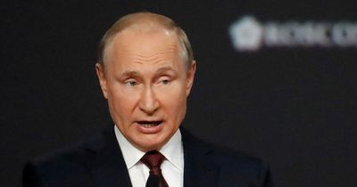 Vladimir Putin 'replaced 1,000 personal staff last month over fears they'd poison him'