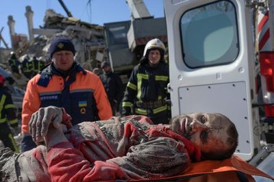 Ukraine news – live: Dozens feared dead in Russian attack on barracks, as Putin ‘panicked’ by revolution fear