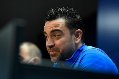 Xavi says Barcelona's 'doors are open' to Messi