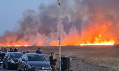 Fire burning on Wirral marshland believed deliberately started