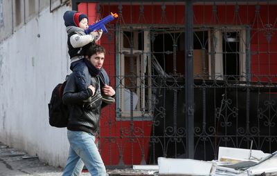 As fighting rages in Mariupol, Ukraine's Zelenskiy appeals for help from Israel