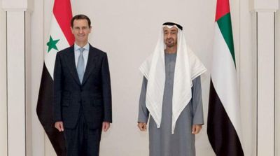 Gargash: Assad Visit Stems from UAE Position to Perpetuate Arab Role in Syria