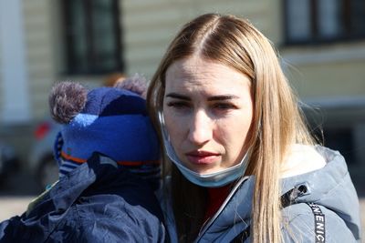 In Krakow rail station, Ukraine war refugees find care amid chaos