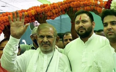 Sharad Yadav merges his party with RJD, seeks opposition unity
