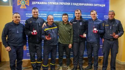 VIDEO: Ukraine’s President Zelensky Gives Emergency Workers Medals For Their Courage