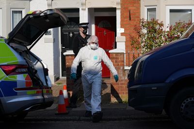 Woman charged with murder after man’s body found buried in back garden