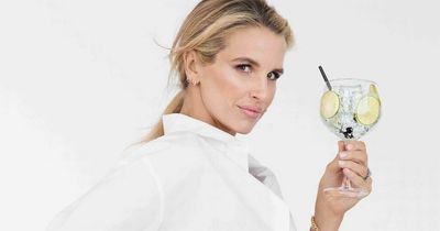 Vogue Williams poses with booze free gin on unusual maternity shoot