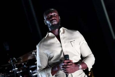 Gang signs and flair: Stormzy gatecrashes a couple’s wedding in Manchester