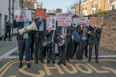 Pupils at London’s ‘socialist Eton’ join protest against being taken over by an academy chain