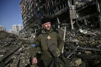 Eight killed as Russian shells destroy shopping centre and homes in Kyiv
