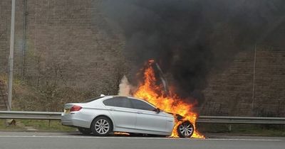 Firefighters rush to M62 after car bursts into flames