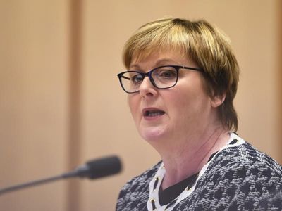 Federal minister cleared of contempt