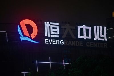 Debt-ridden Evergrande urges investor 'caution' as audit result delayed