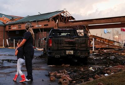 Tornado warning - live: Video shows Texas Walmart shoppers being dragged as South now faces flooding