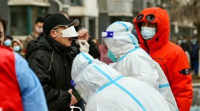 China Locks Down City of 9 Million as Virus Ripples across Country
