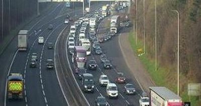 Car on fire on M8 in Glasgow sparks traffic chaos as police race to scene