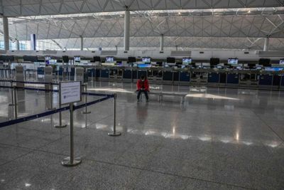 Hong Kong airport to lift transit passenger ban from April 1