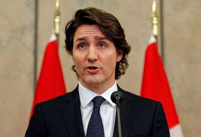 Canada’s Justin Trudeau reaches deal to stay in power until 2025