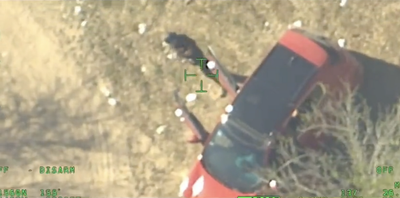 Gunman with AK-47 filmed aiming at Texas border patrol helicopter while it flies overhead