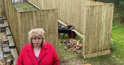 Fury after resident erects 'depressing eyesore' sheep pen-style fence in garden