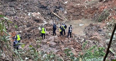 Harrowing images from Chinese Eastern plane crash site show charred personal belongings