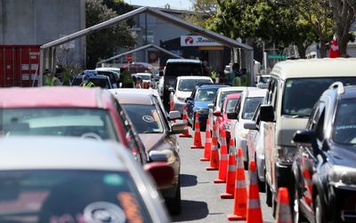 New Zealand lifts most vaccine mandates as Omicron outbreak nears peak