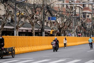 Shanghai denies lockdown rumours as daily COVID infections near 1,000