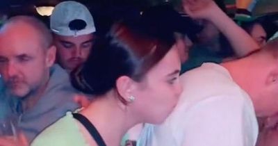 TikTok viewers divided over woman's 'prank' kissing unsuspecting men in bars