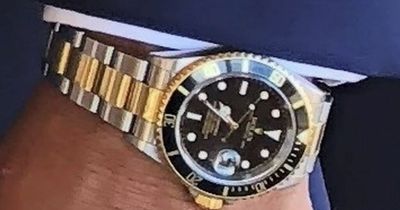 Thugs hold runner at knife point and steal his Rolex watch at popular park