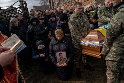 AP PHOTOS: 1 MONTH: War in Ukraine rages on; 3M have fled