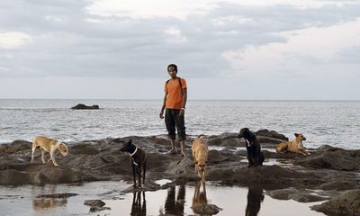 Djoubi with his five canine bodyguards: Laura Henno’s best photograph